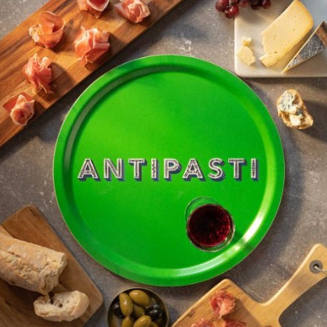 Grön bricka med texten Antipasti