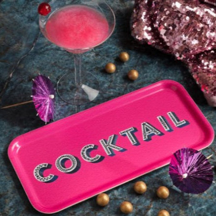Rosa brick med texten cocktail