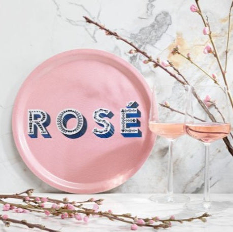 Rosa bricka med texten Rosé